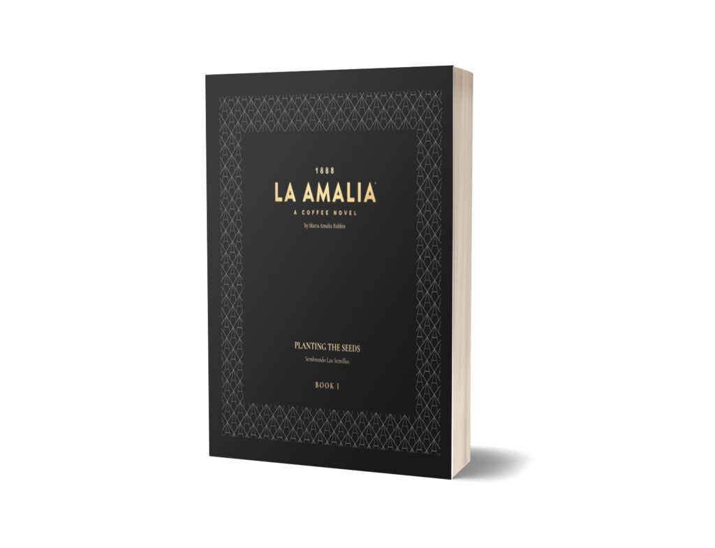 Cover of the book titled 'LA AMALIA: A COFFEE NOVEL' by Marcia Amalia Roblin, with the subtitle 'PLANTING THE SEEDS - Siembra Las Semillas'. The cover has a dark geometric pattern background with the text in gold and white. It is labeled as 'BOOK 1'.